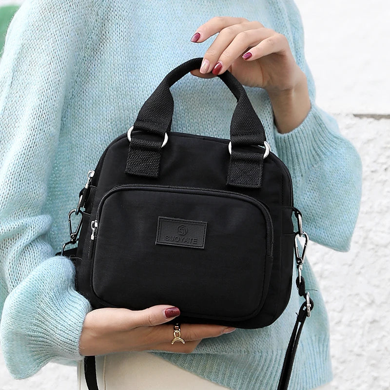 Borsa da donna spaziosa con doppia cerniera (S)