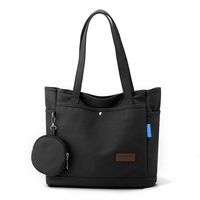 Borsa spaziosa alla moda in tela (S)